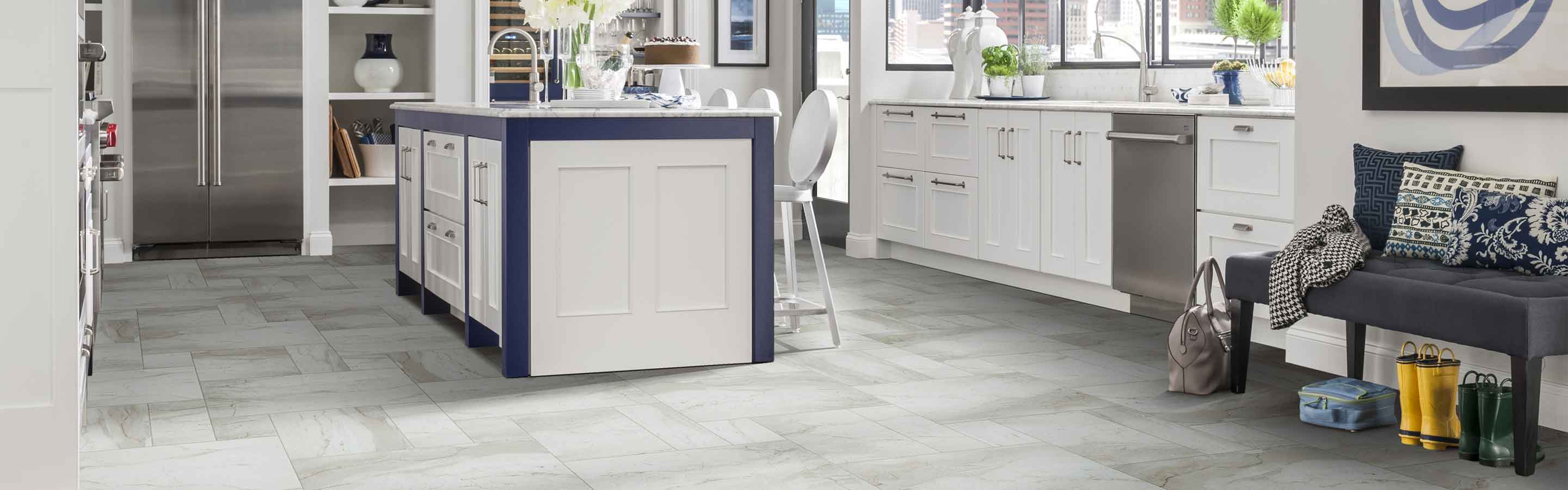 tile in modern with kitchen with island counter and blue accents